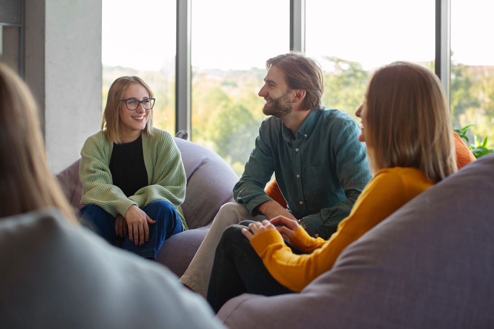 Group therapy session at an addiction treatment center, representing support programs for individuals dealing with a DUII